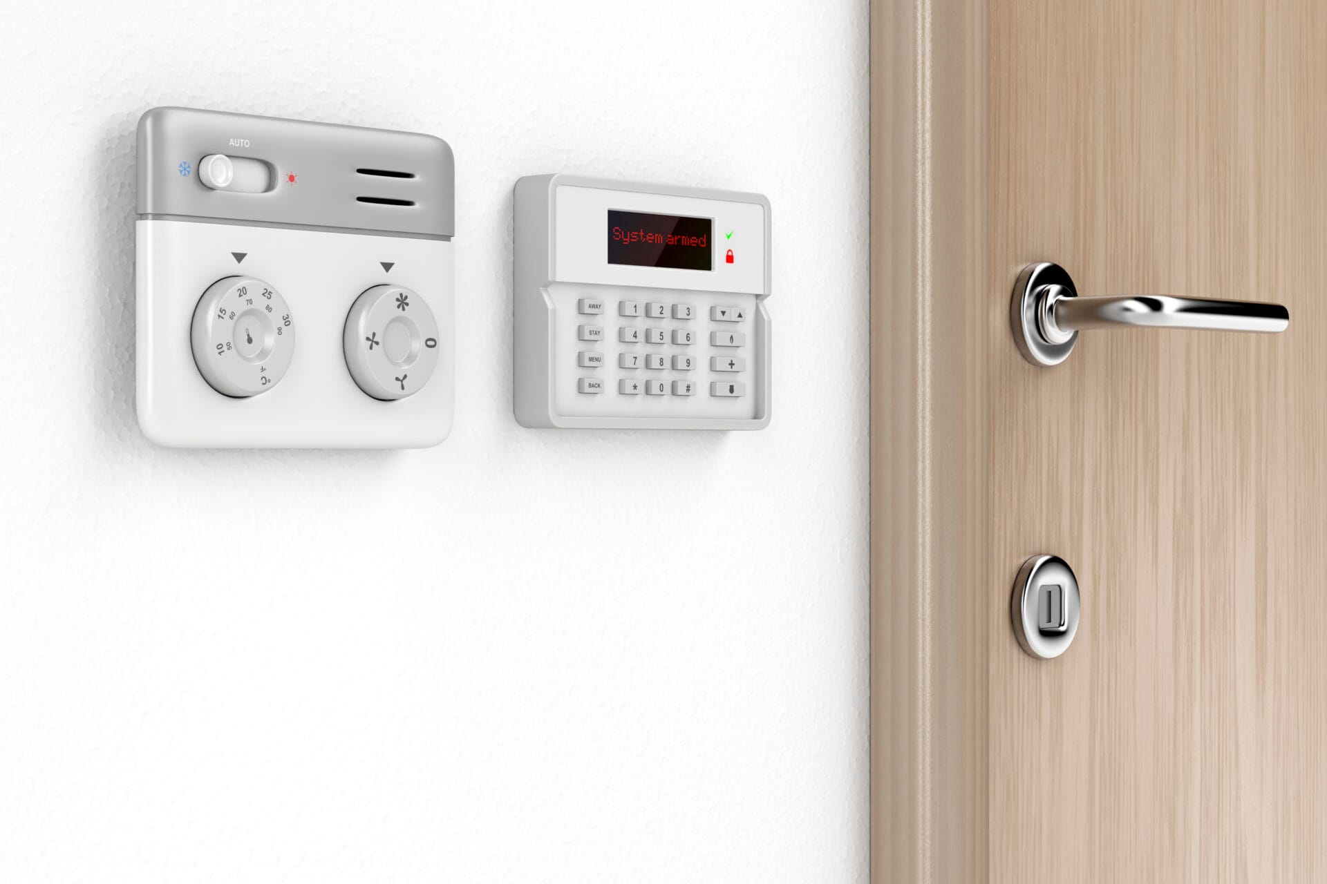 Thermostat and intruder alarm control panels on a wall